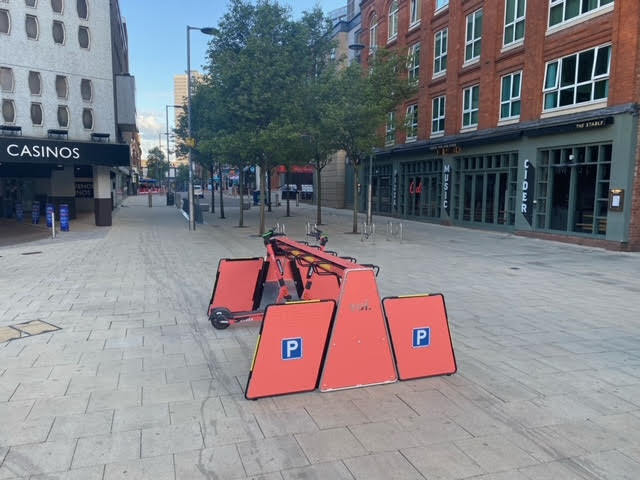 Voi shared micromobility parking infrastructure placed on a pedestrian street in Northampton