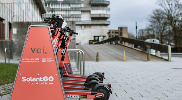 Voi scooters parked in Standab physical parking infrastructure in the Solent region
