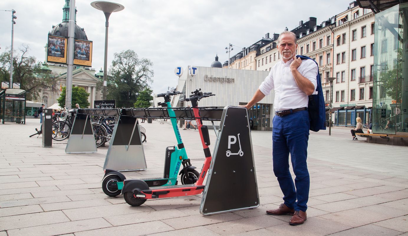 Voi and Tier scooters parked in shared micromobility infrastructure in Stockholm